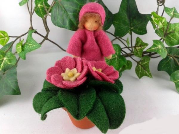 Blumenkind Jahreszeitentisch Frühling Osterglocke Primel rosa Blumenkind Jahreszeitentisch Frühling Osterglocke Primel rosa